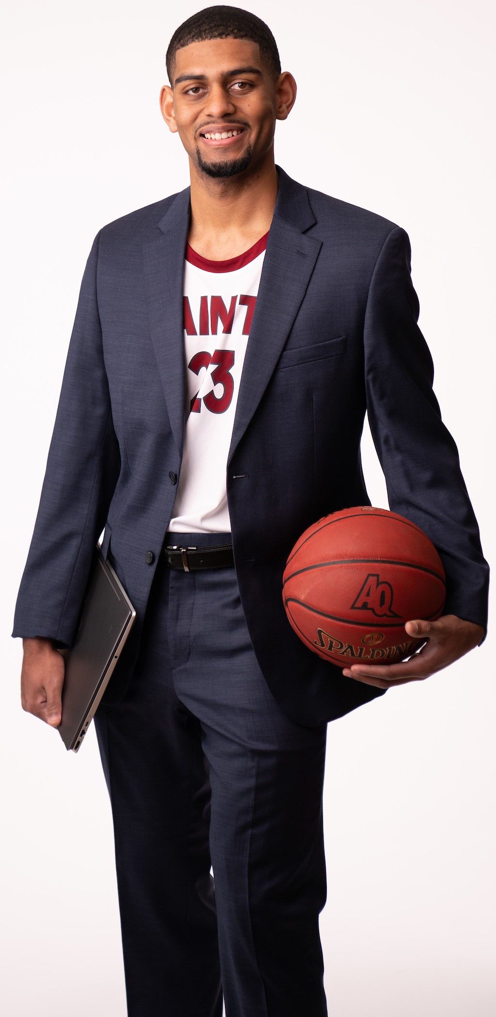 Justin Lary holding a basketball