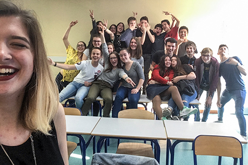 Miranda Burel with one of her classes in France
