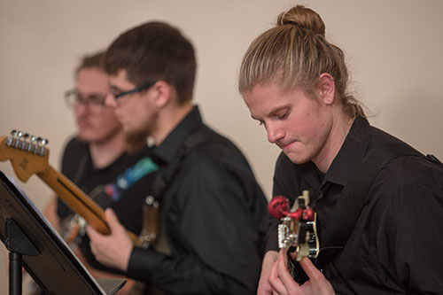 students playing guitar