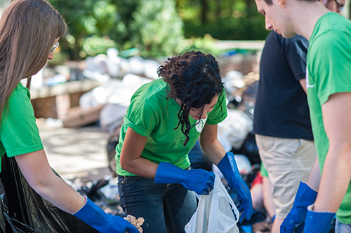 people picking up trash