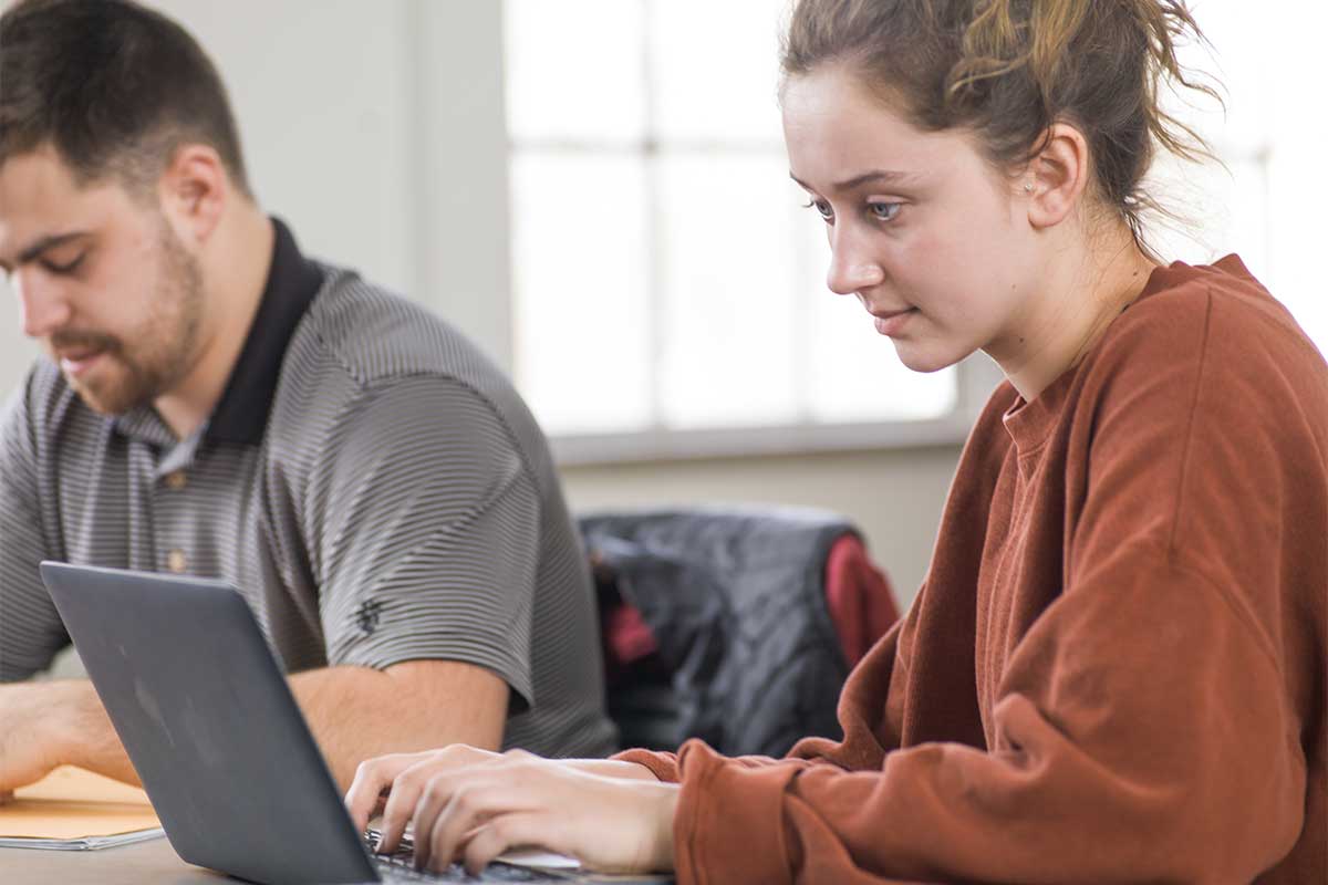 Student working on a laptop