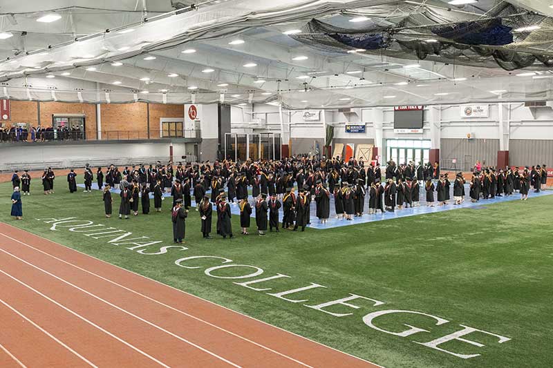 Graduating students line up in Alksnis