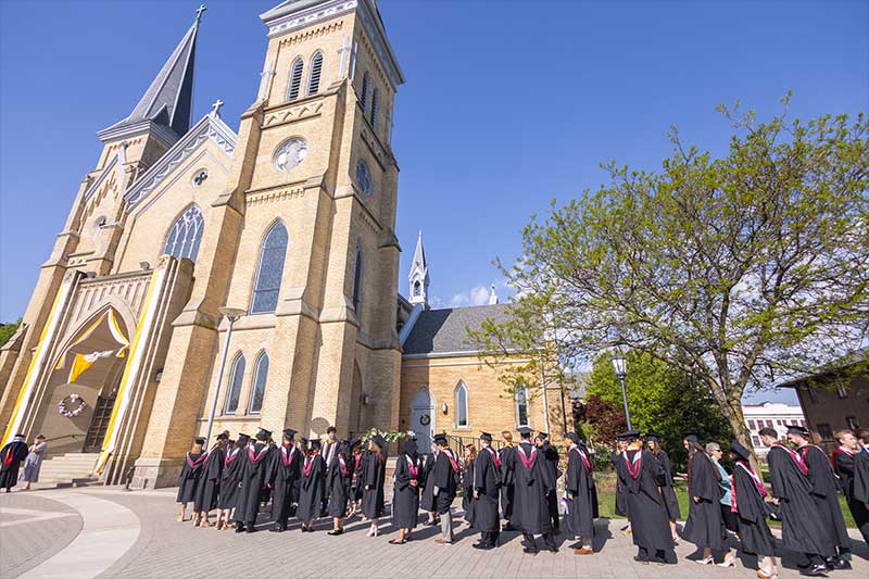 Lining up for Baccalaureate Mass