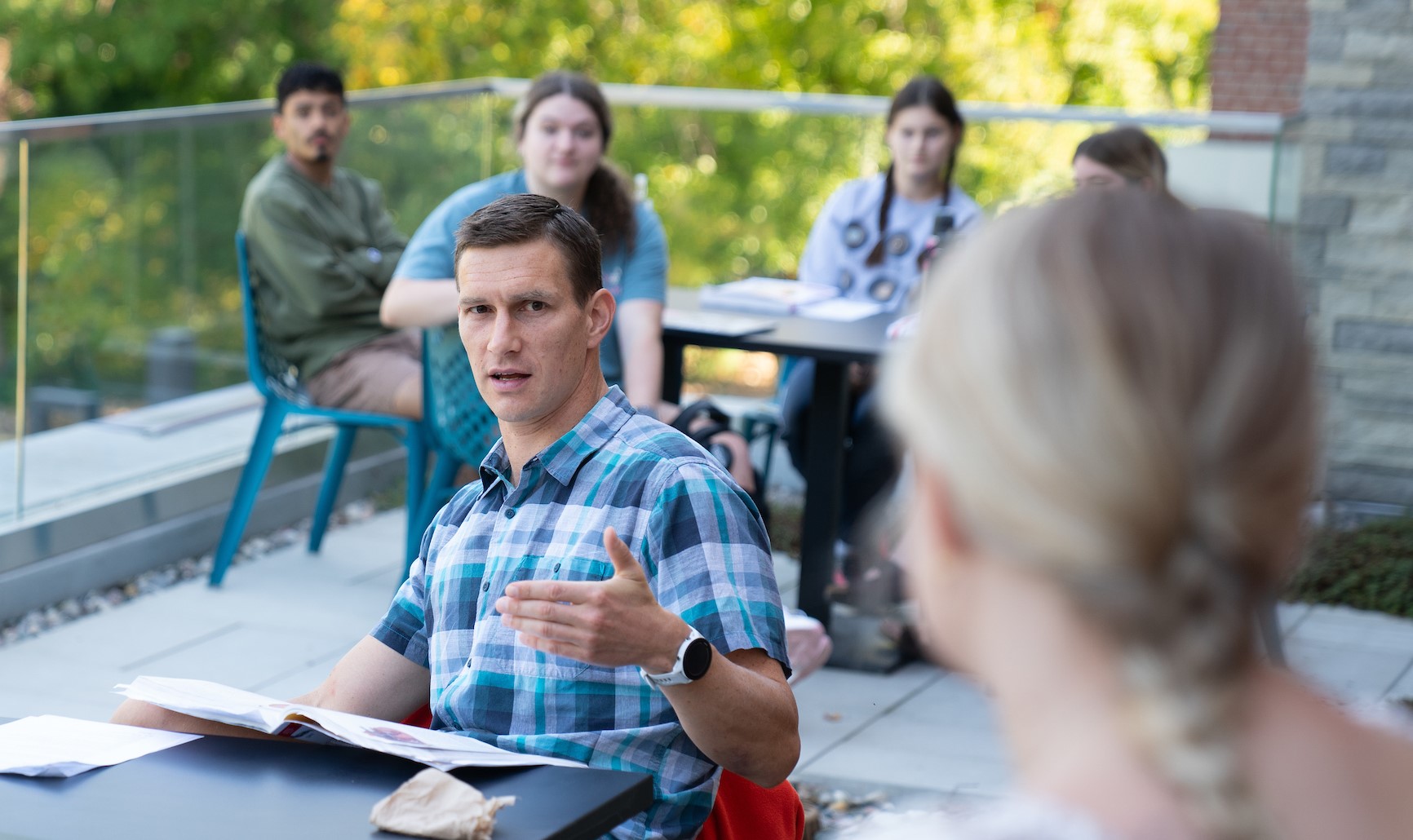 Professor Rob Peters teaches outside