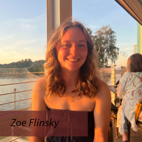 Picture of a girl with shoulder length, blonde hair, outside. Text reading: Zoe Flinsky