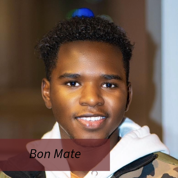 Headshot of a boy with short, dark hair and facial hair. Text reading: Bon Mate, Writing Center Consultant.