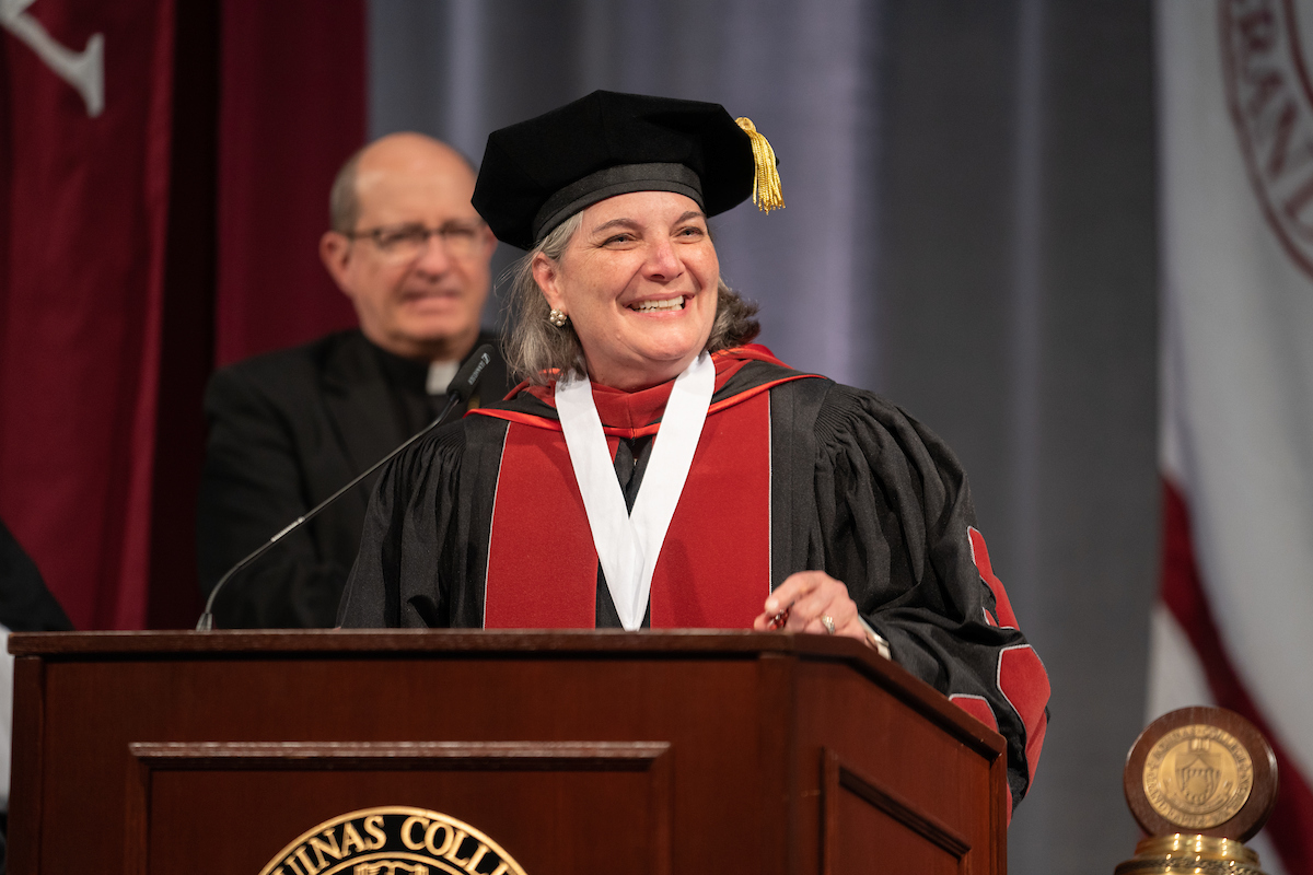 Alicia Cordoba in Regalia at the podium