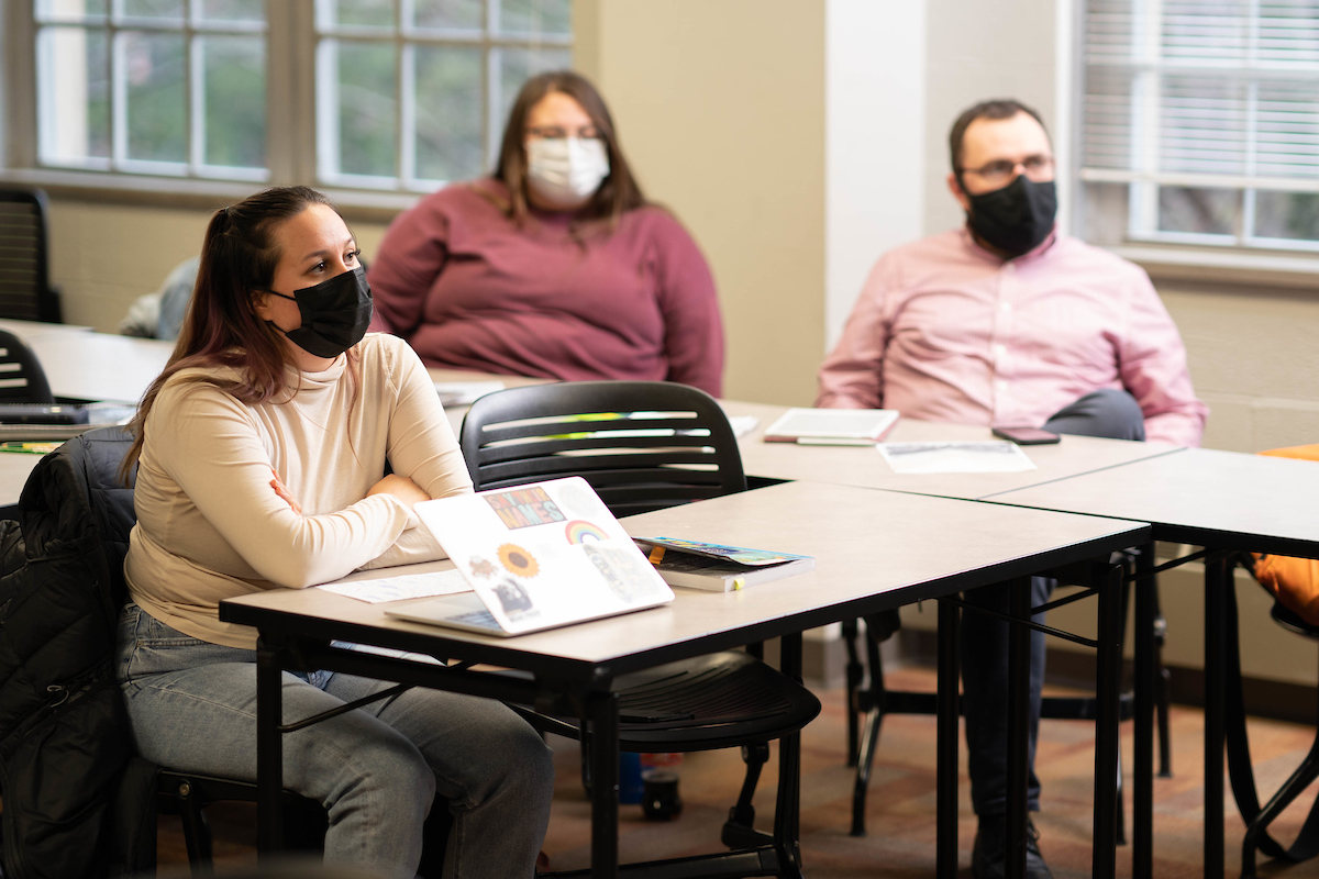 Students listening to a lecture in a clasroom