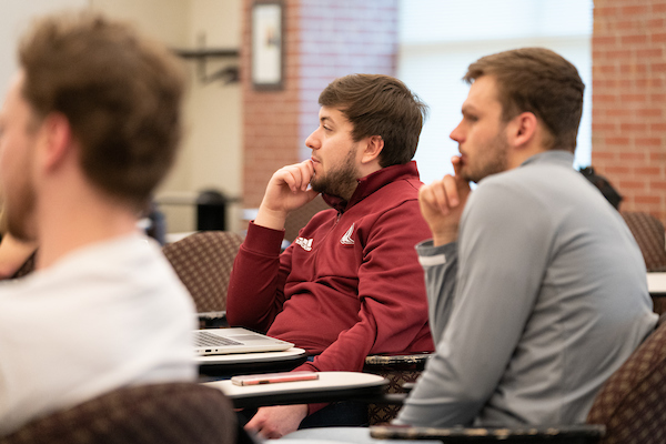 Students in a lecture, listening