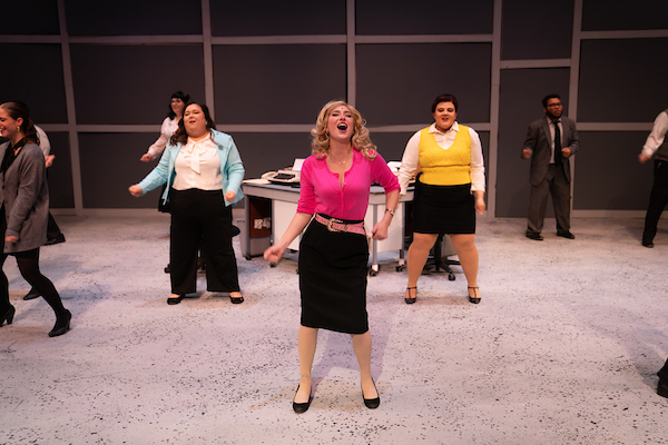 Students performing in 9 to 5