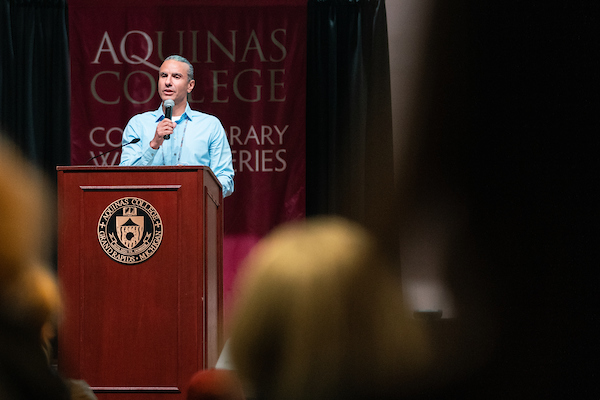 Anton Treuer speaking at a podium