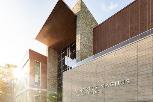 Albertus Magnus Hall with sun gleaming off the corner