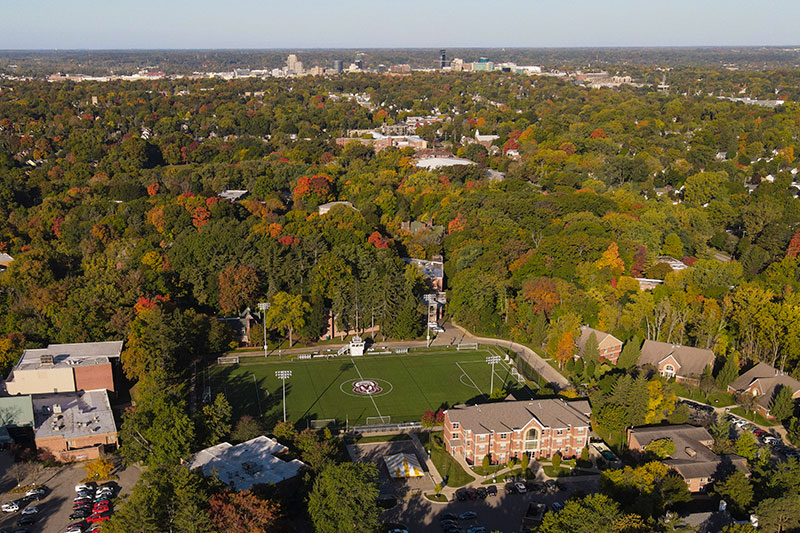 Aerial view of Aquinas College in the foreground and downtown Grand Rapids in the background.