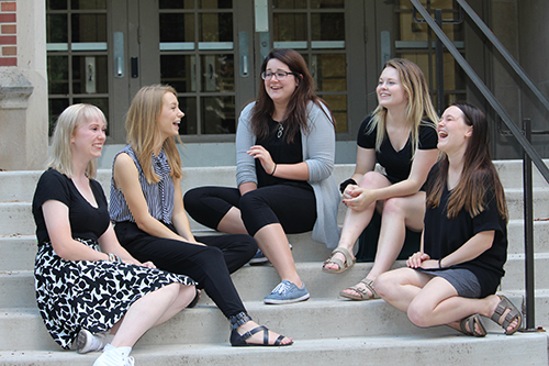 Students talking on steps