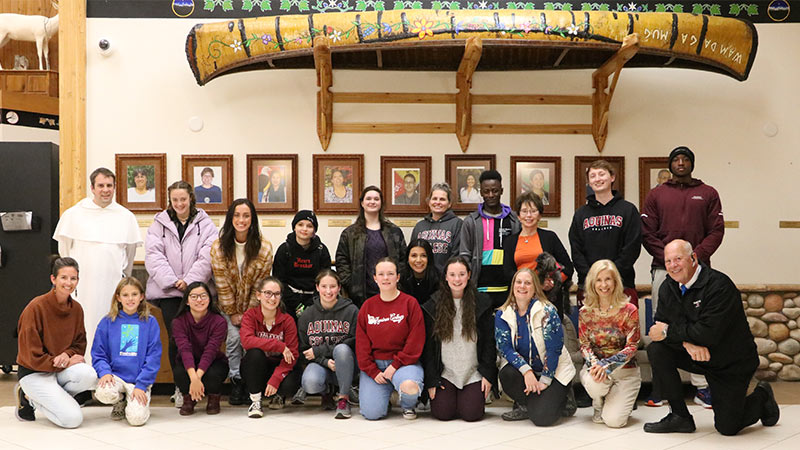 Students and staff pose for photo