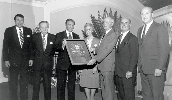 In 1990, Sister Aquinas received the Tree of Life award from the Jewish National Fund in a special ceremony and recognition dinner at the Amway Grand Plaza Hotel. Personal friends and friends of Aquinas College join together to help her celebrate. Left to right, Pat Quinn, Hy Berkowitz, John Canepa, Sister Aquinas, Raymond Knape, Mr. Subar, and a representative from the Jewish National Fund.